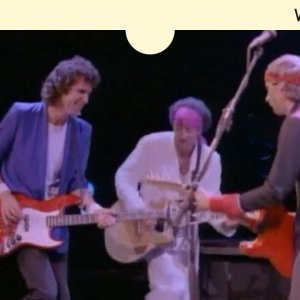 Dire Straits - Walk Of Life (Official Music Video)