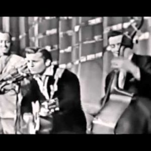 Johnny Burnette Trio-Train Kept A Rollin'